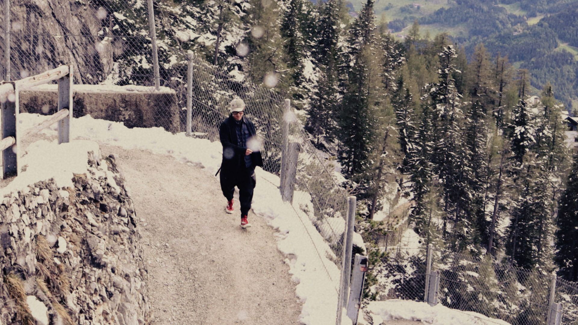 Portrait of a person walking on a mountain path